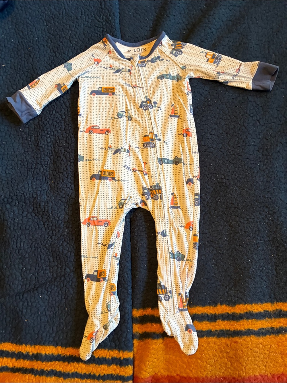 Lark white/blue Footed One-Piece with Blue and Orange Vehicle Print